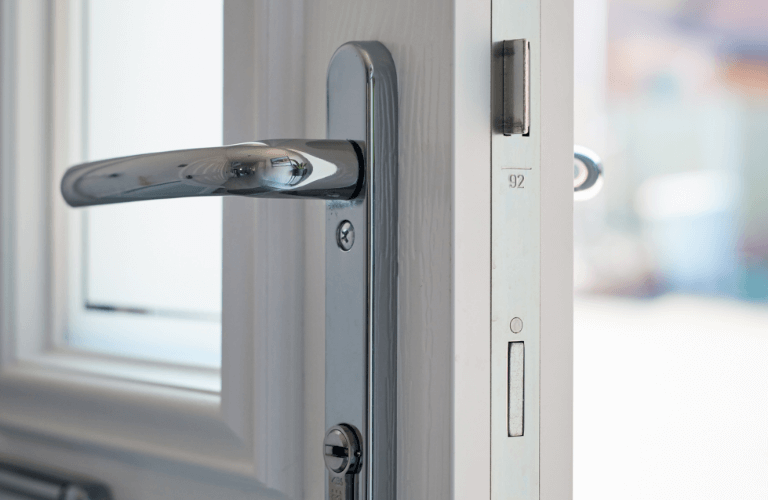 Close-up of a composite door’s multi-point locking system demonstrating enhanced security.