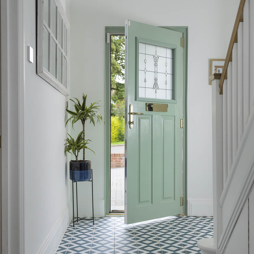 Traditional timber back door providing natural warmth to UK country home.