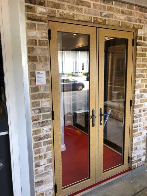 Fully glazed uPVC back door connecting modern kitchen to garden area.