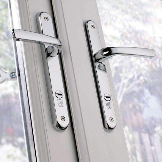 Anti snap three star lock cylinder and high security handle installed on a white uPVC front door supplied by Doorland UK